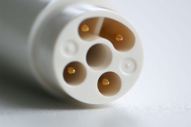 Pièce à main US compatible EMS plastique avec lumière LED