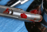 Racleur à os droit